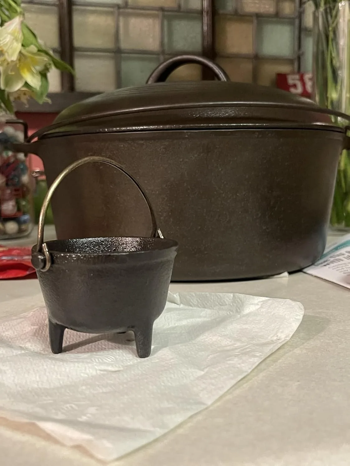 Customer photo showing rust removal results comparing vinegar, electrolysis, and wire wheel methods on metal samples