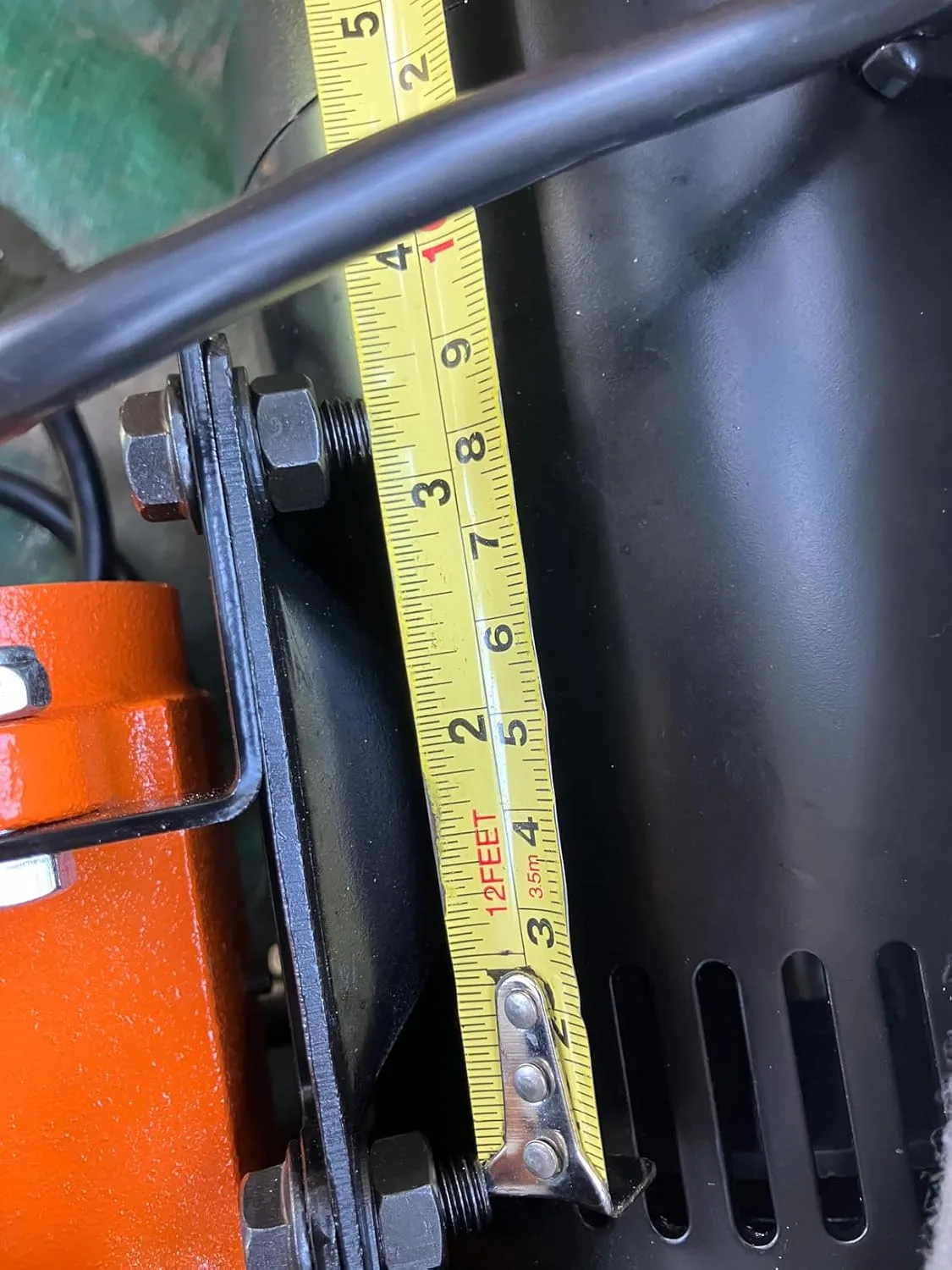 Customer photo of benchtop drill press mounted on work table in garage workshop